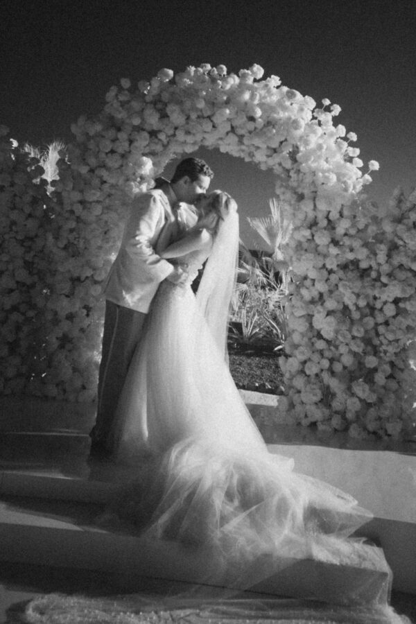 groom kissing bride