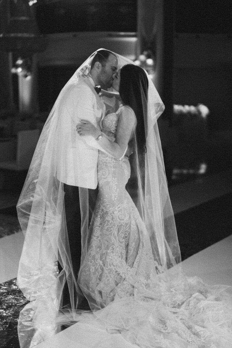 bride and groom kissing