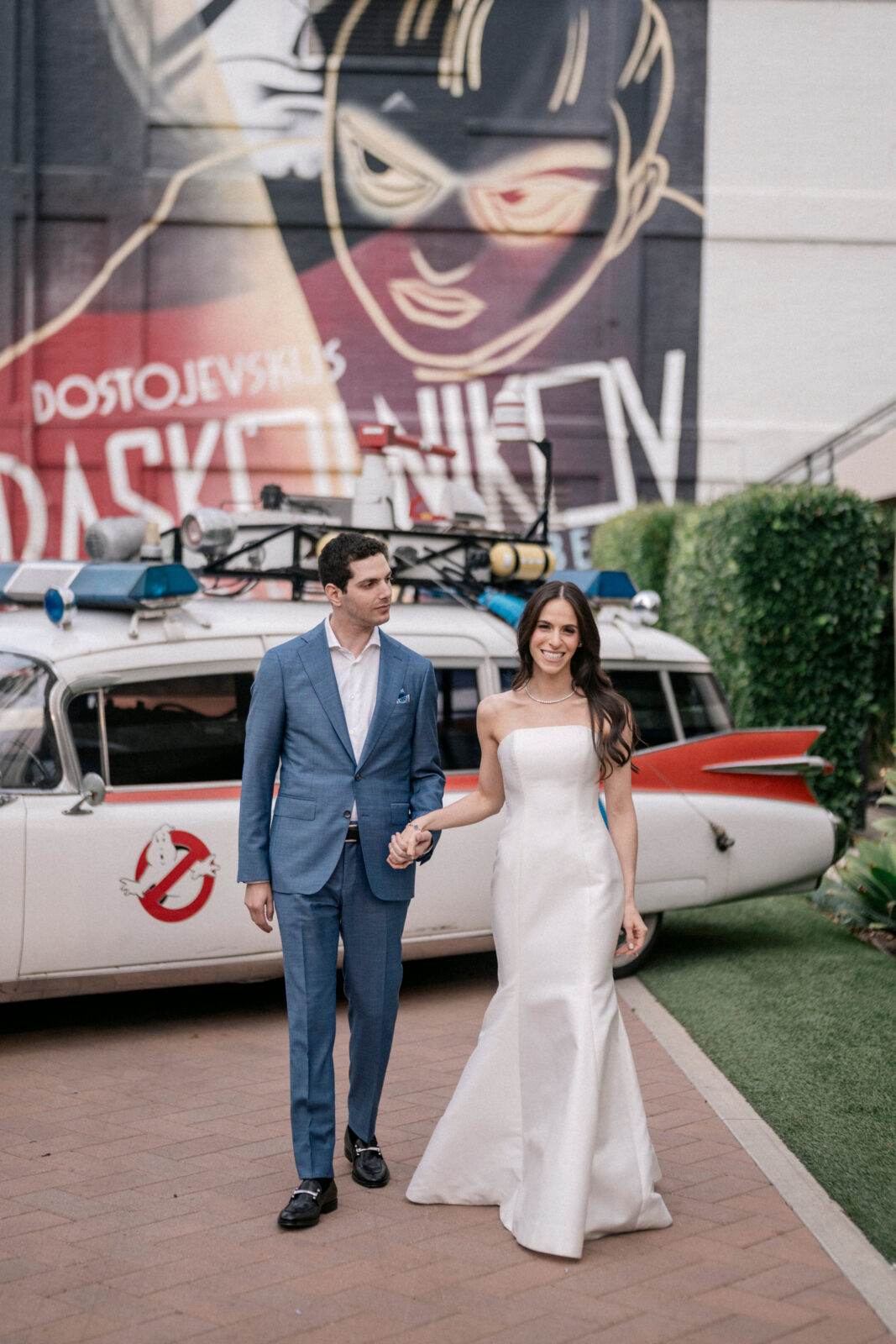 Bride and groom holding hands