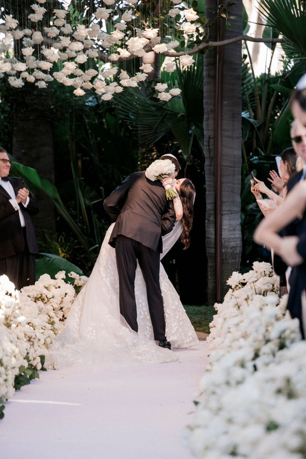 Bride and groom kissing