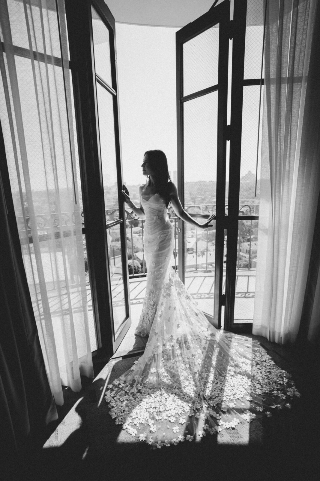 bride at the balcony door