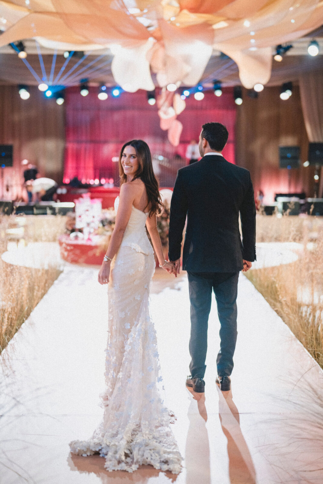 bride look back with groom