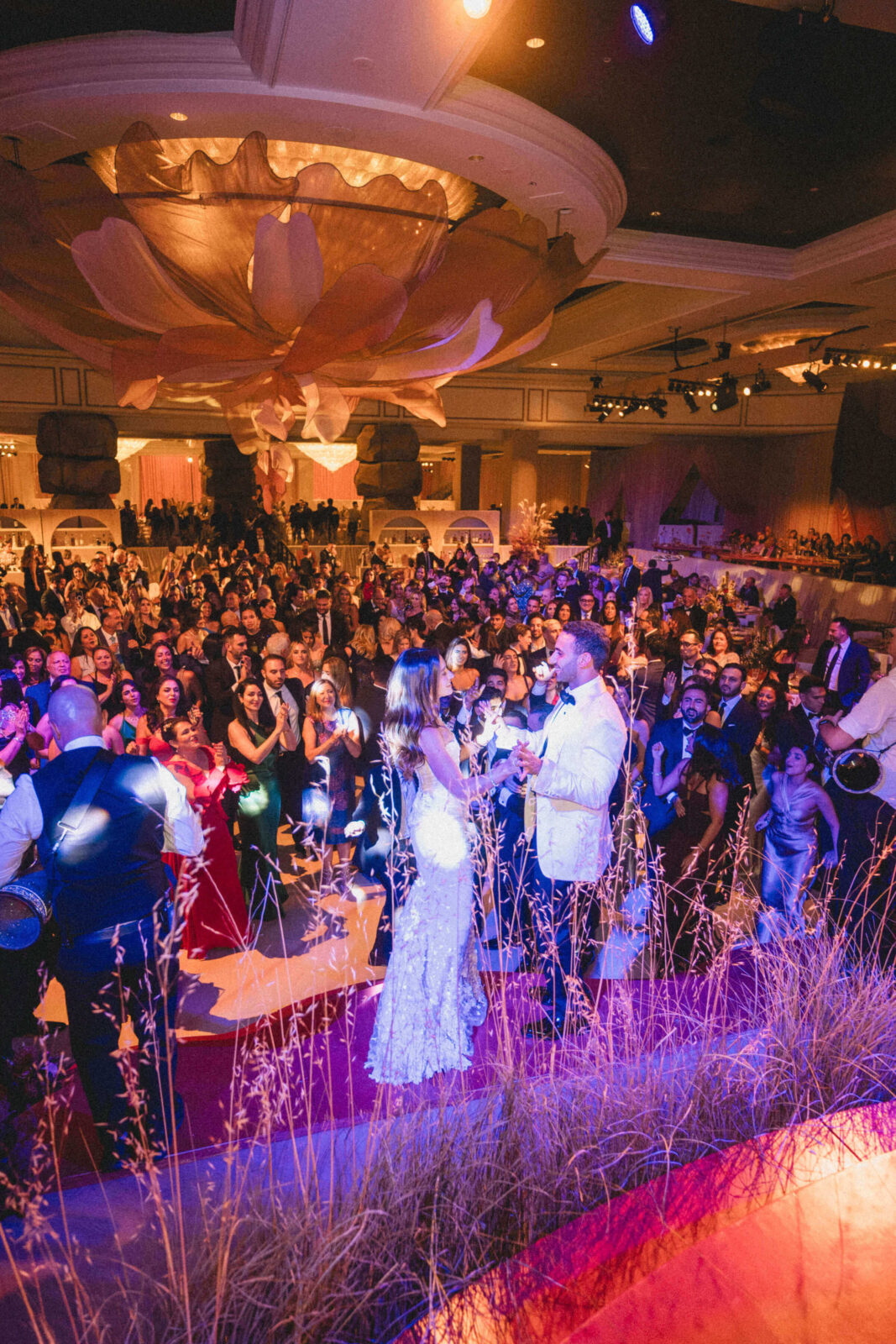 bride and groom infront of the crowd