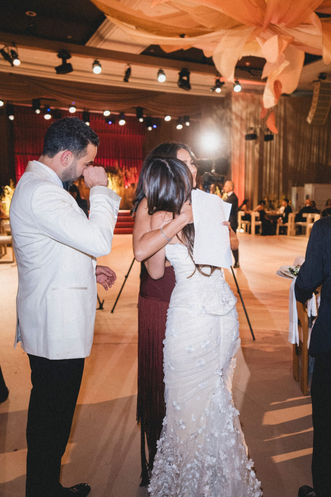 bride and groom with their families