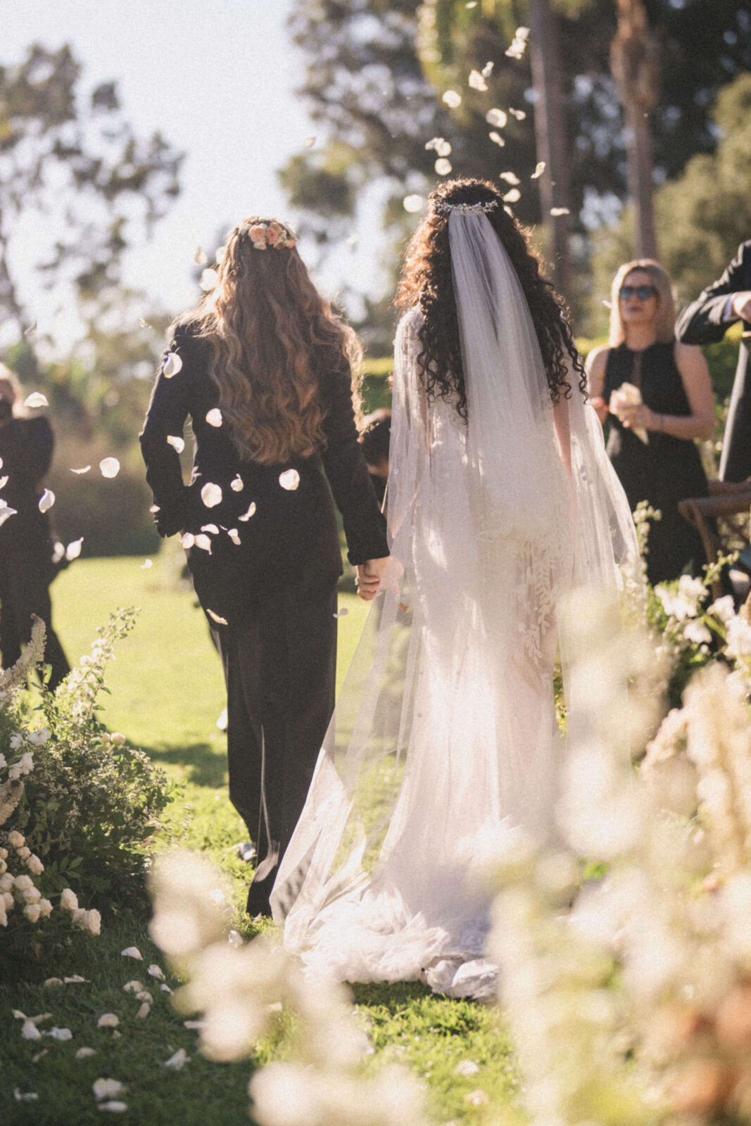 bride and groom walking in the aisle