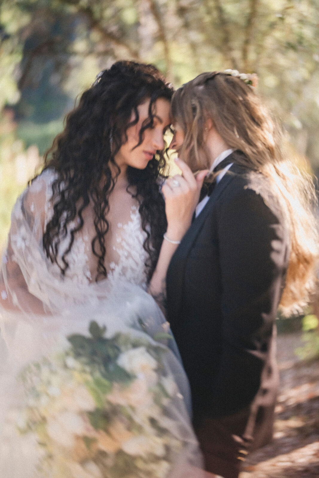 bride and groom facing each other 