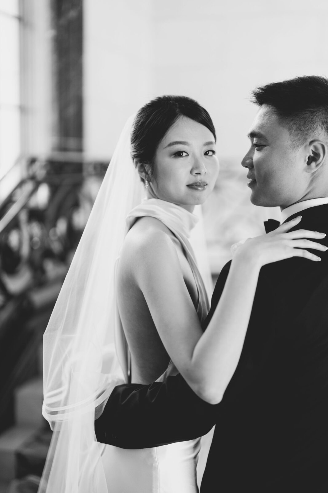 bride and  groom in black and white 