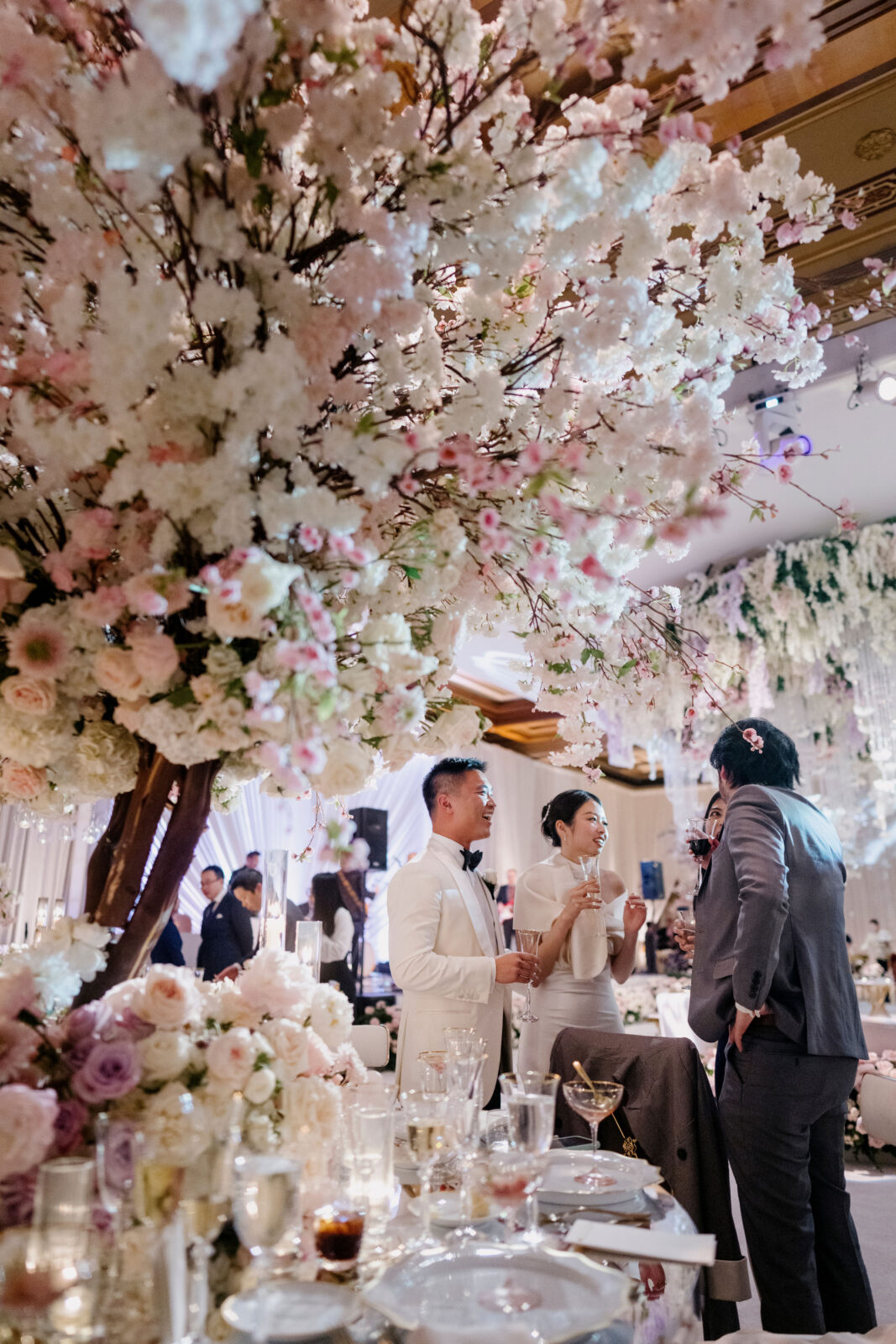 bride and groom talking to relatives