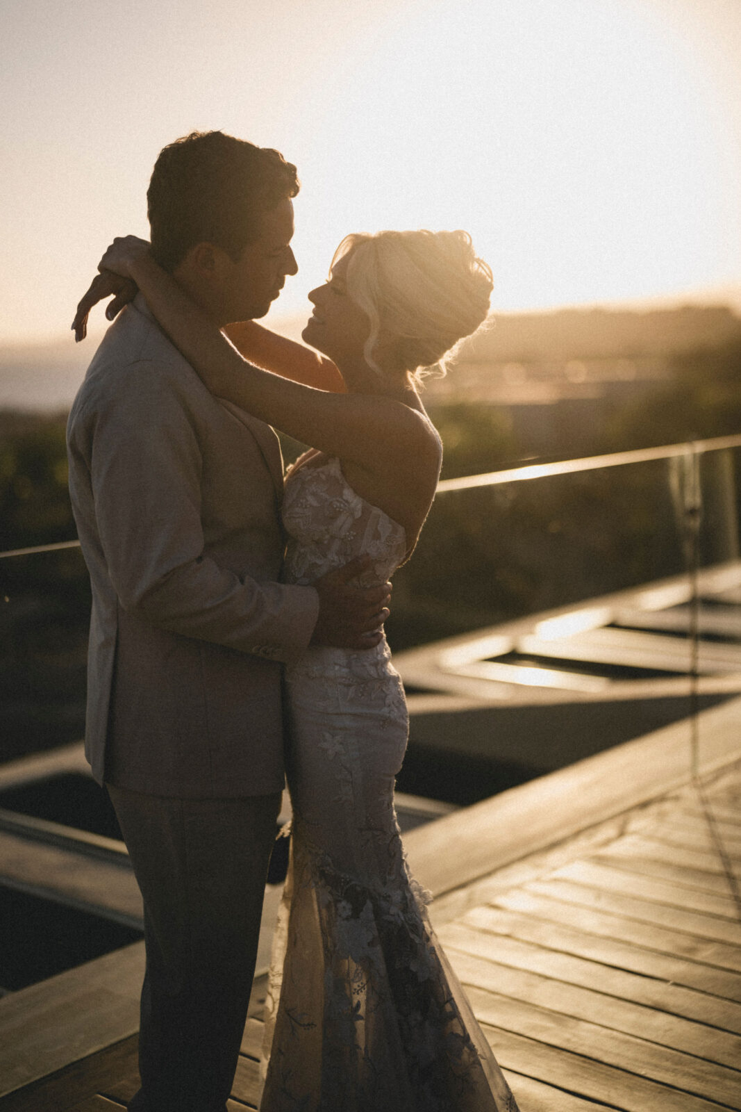 bride and groom hugging each other