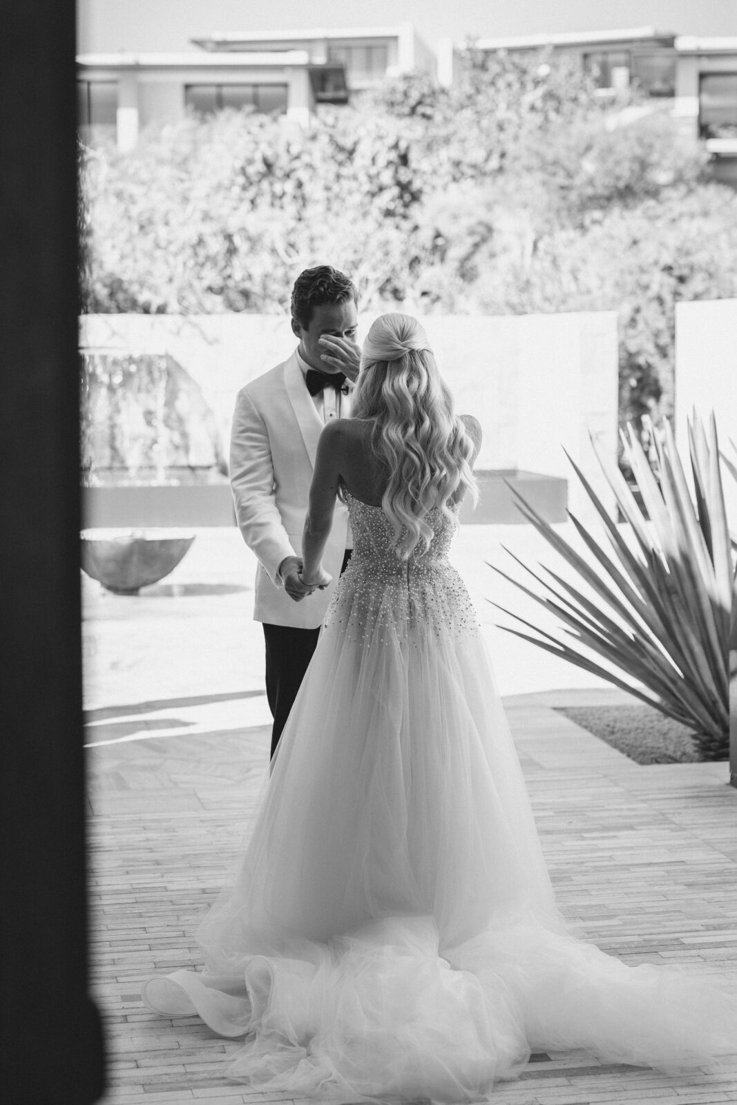 groom crying in front of the bride