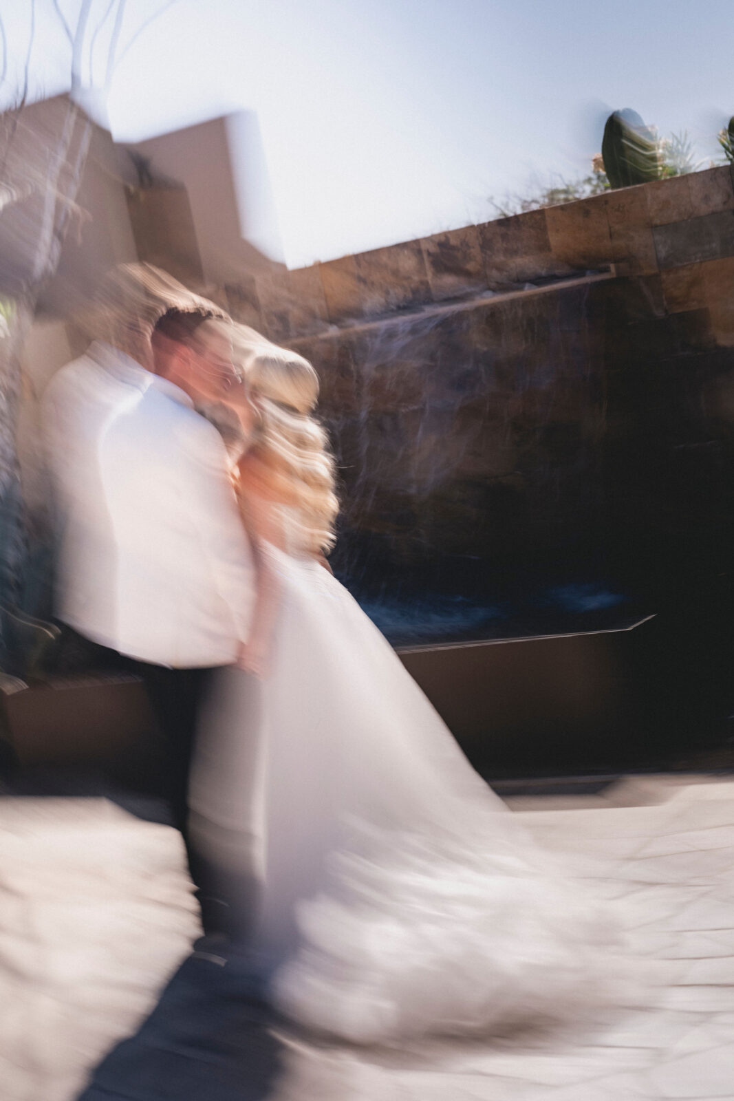 bride and groom kissing