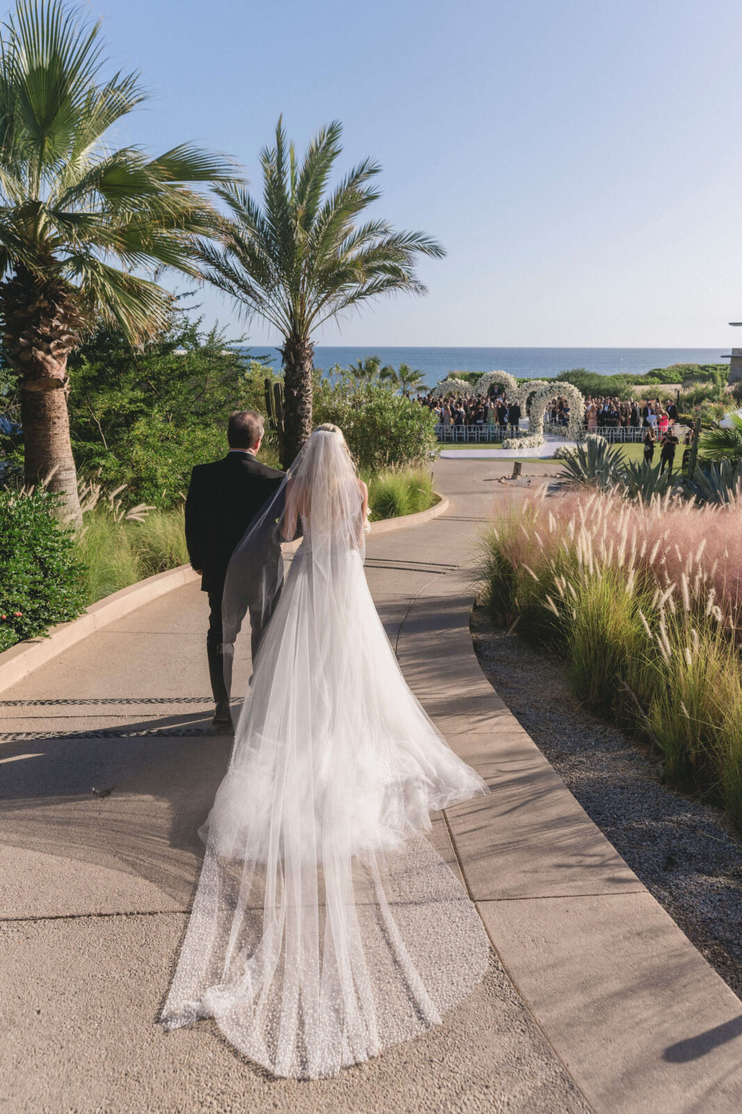 bride and her father walking down the aisle