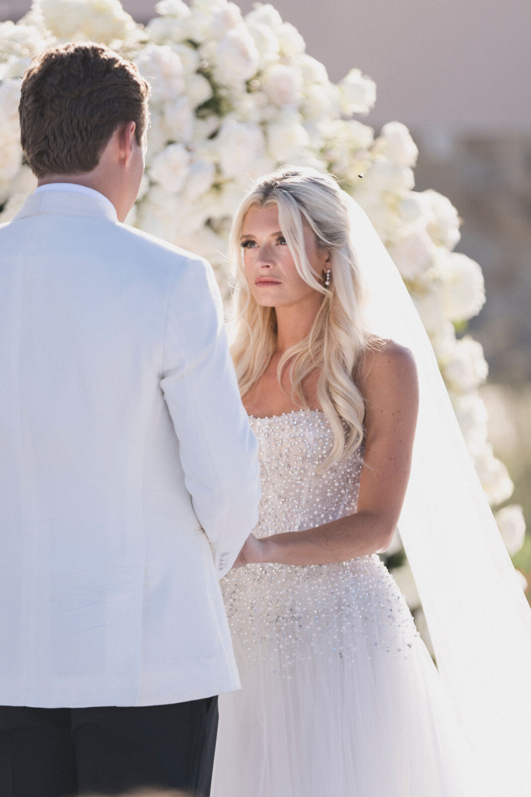 bride and groom exchanging vows