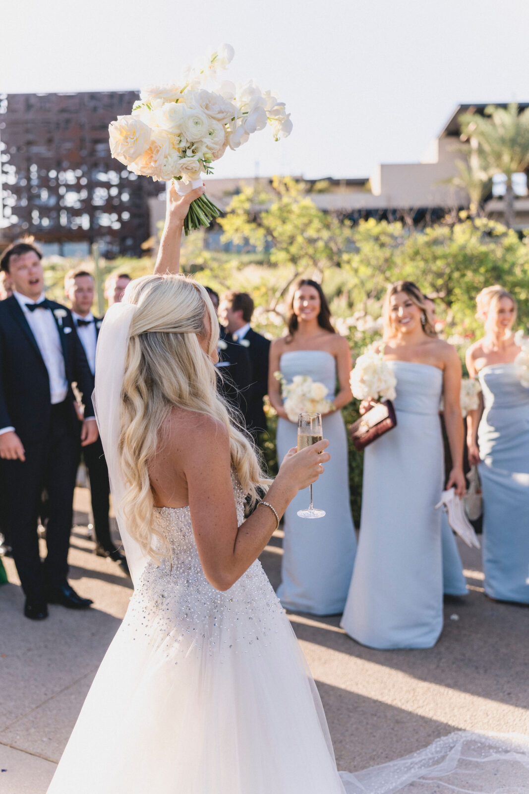 bride about to toss bouquet 