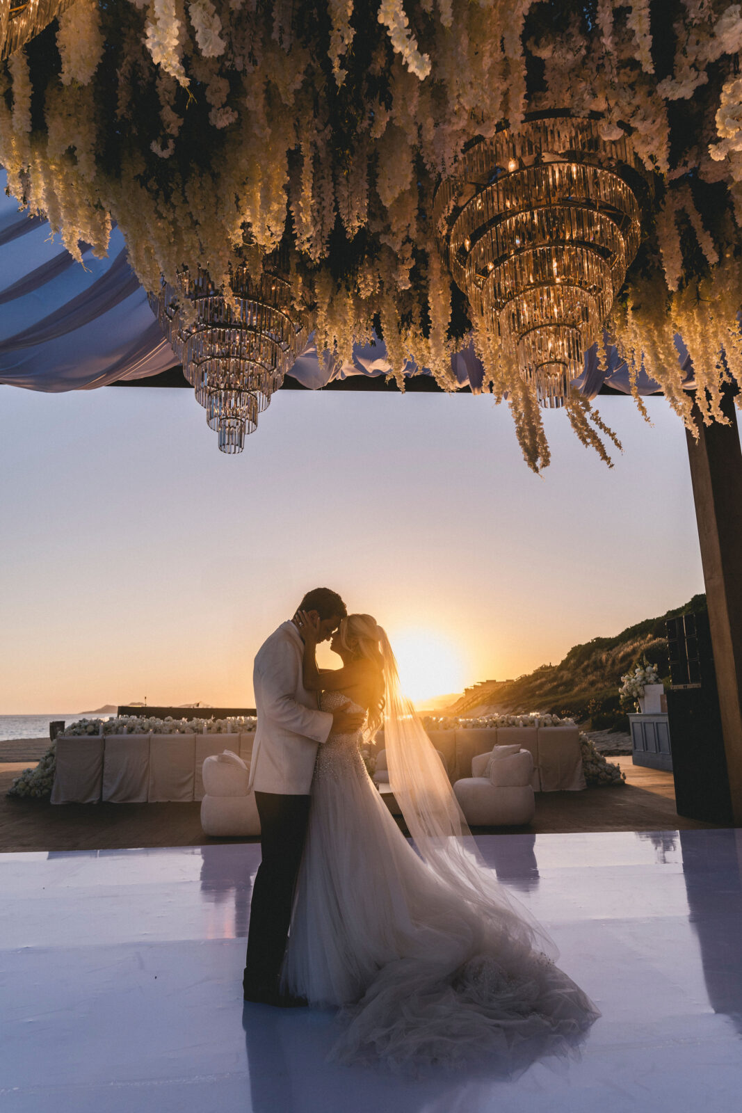 bride and groom hugging