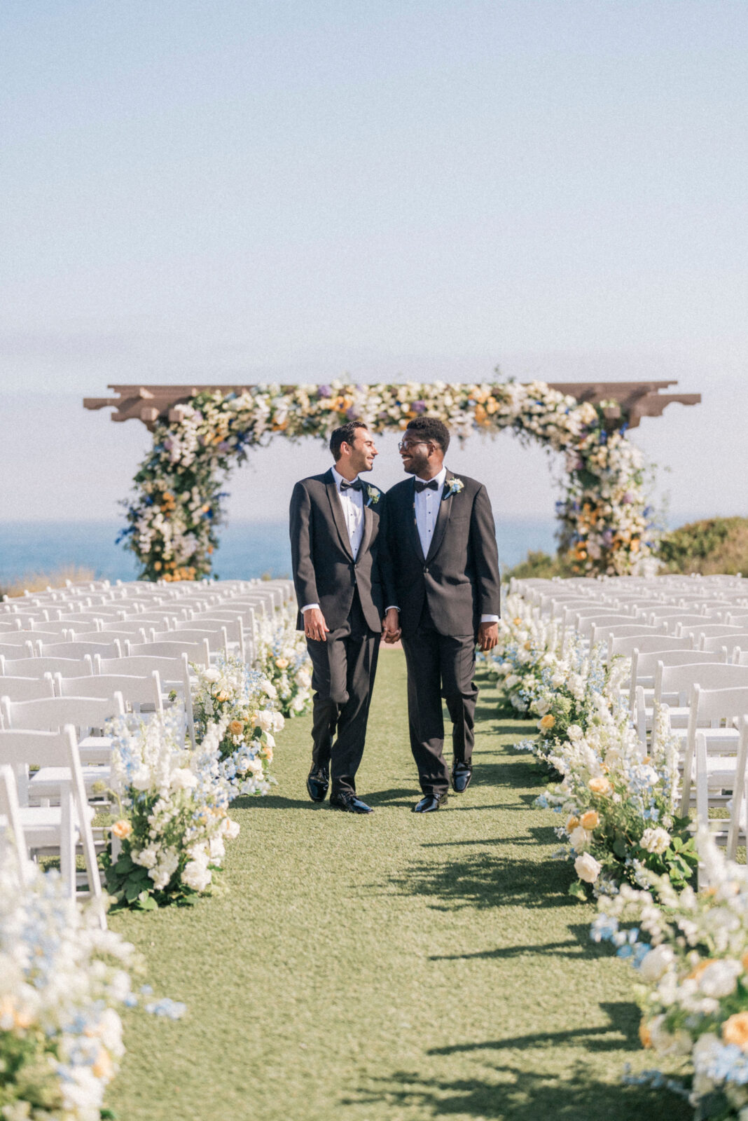 couple holding hands while walking