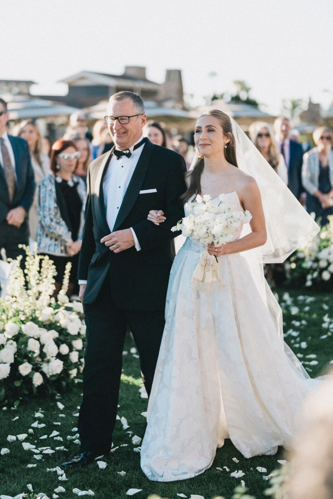 Father and bride walking down the aisle 