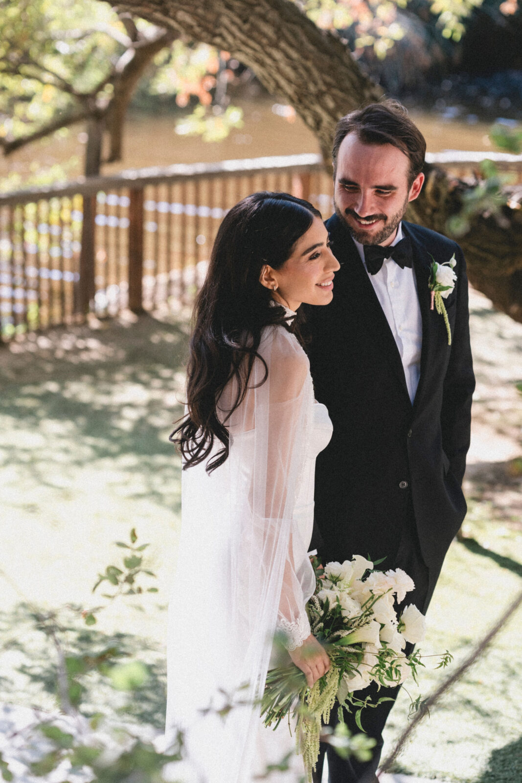 bride and groom looking at each other