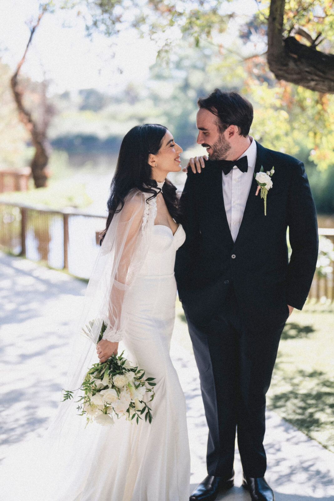 bride and groom looking at each other