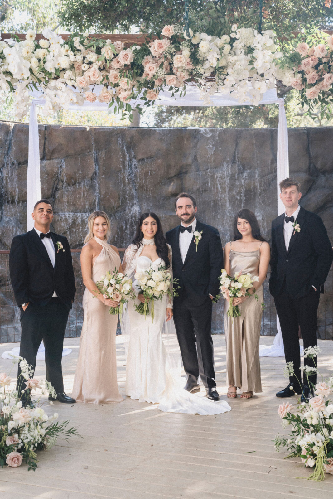 bride and groom with the maid of honors and bestmen