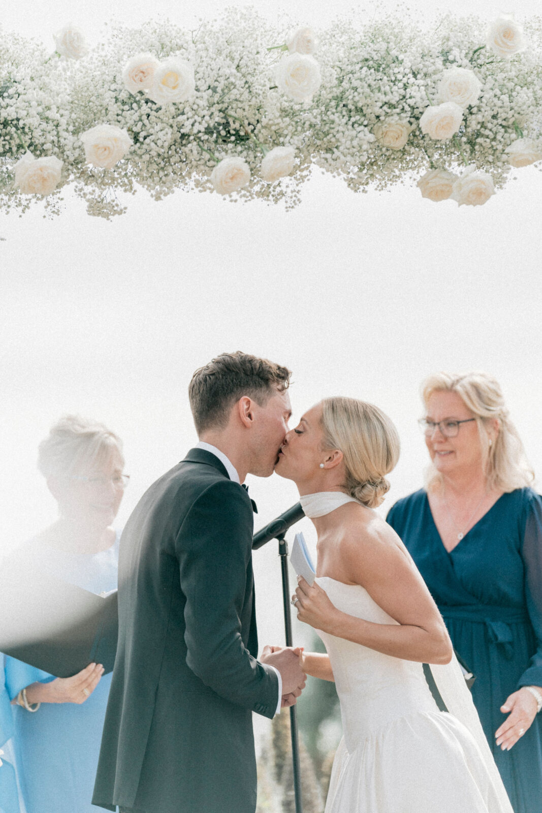 bride and groom kissing