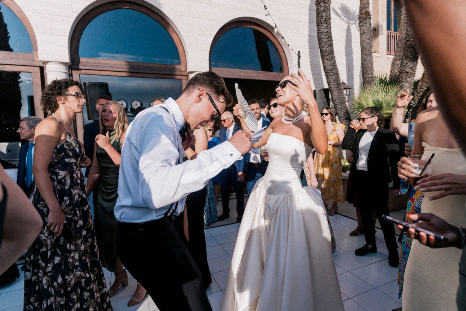 Bride and Groom dancing outside