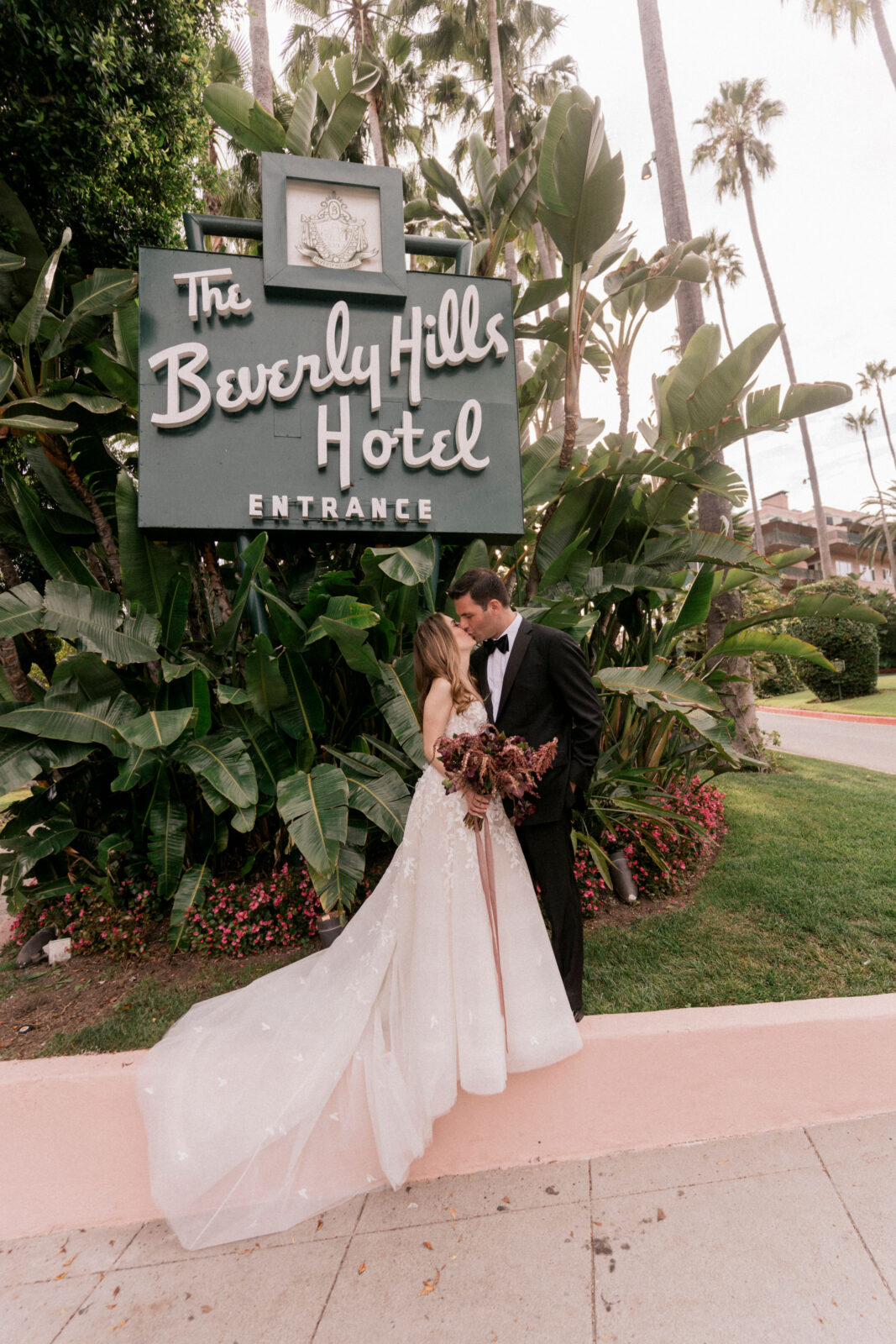 bride and groom kissing