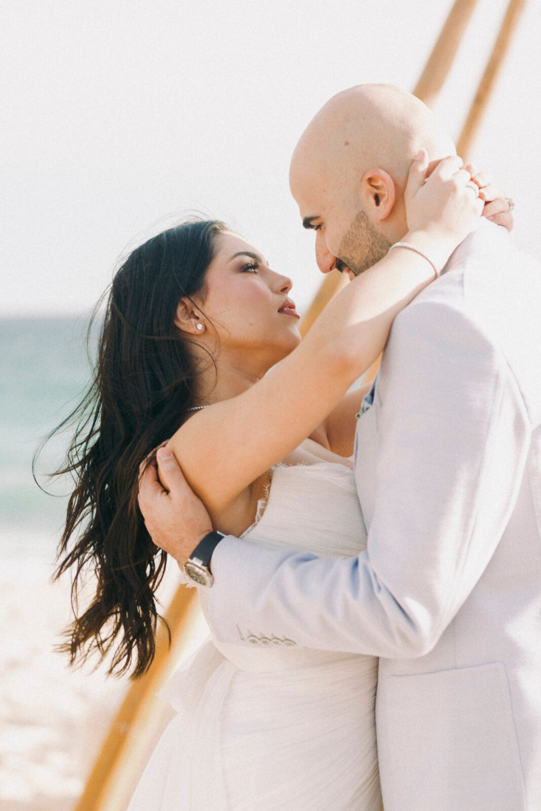 bride and groom looking at each other