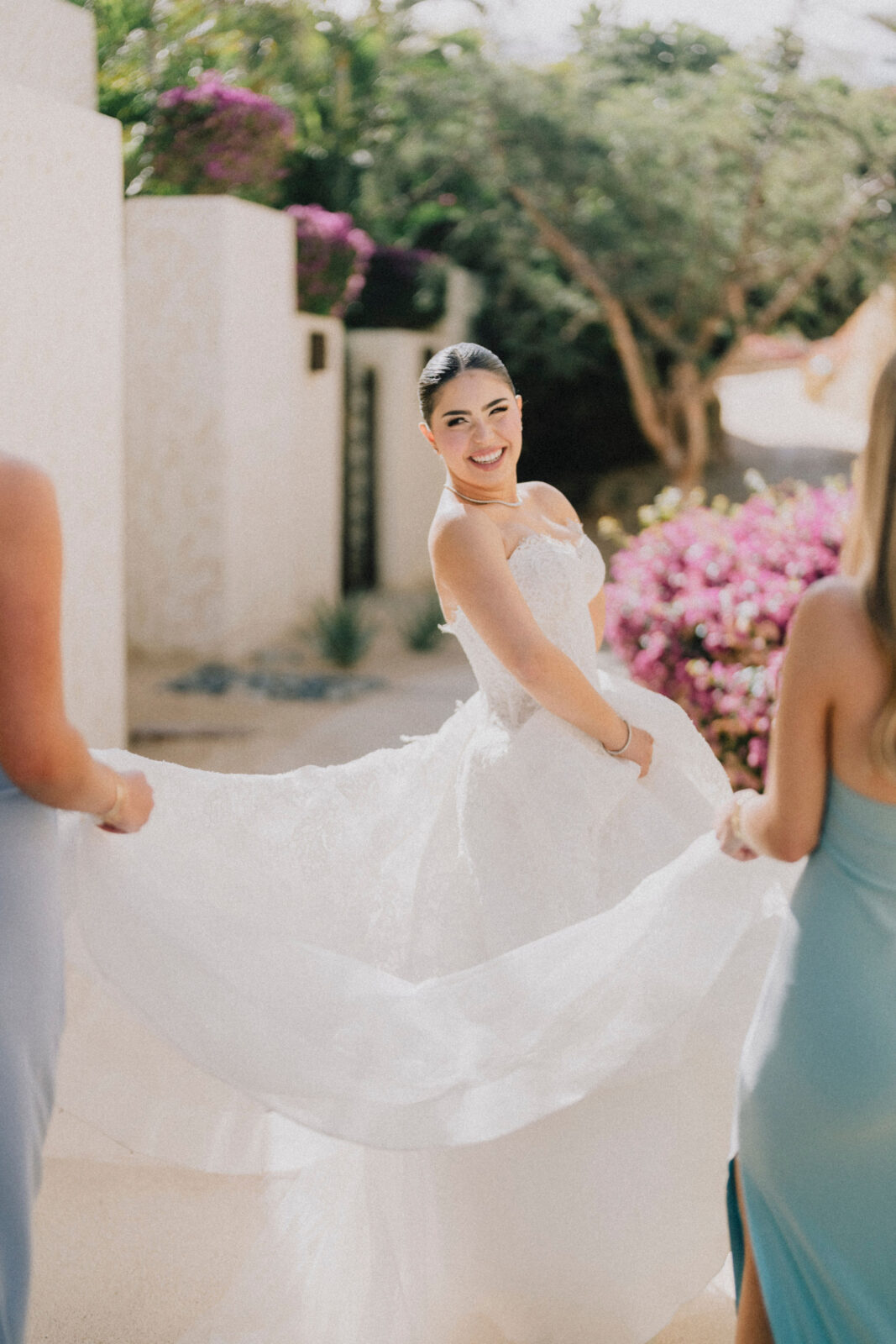 bride smiling at the bridesmaids