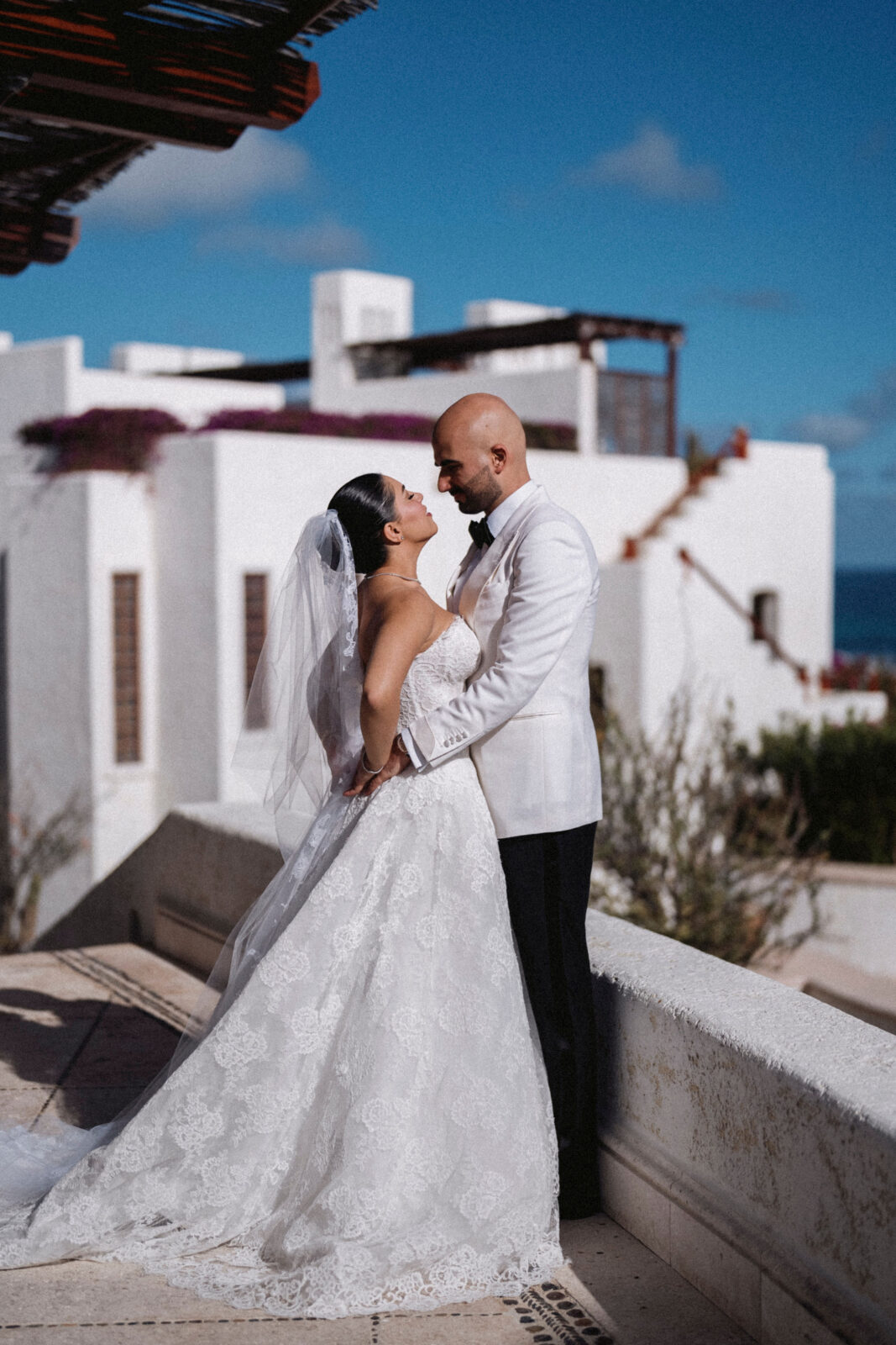 bride and groom looking at each other