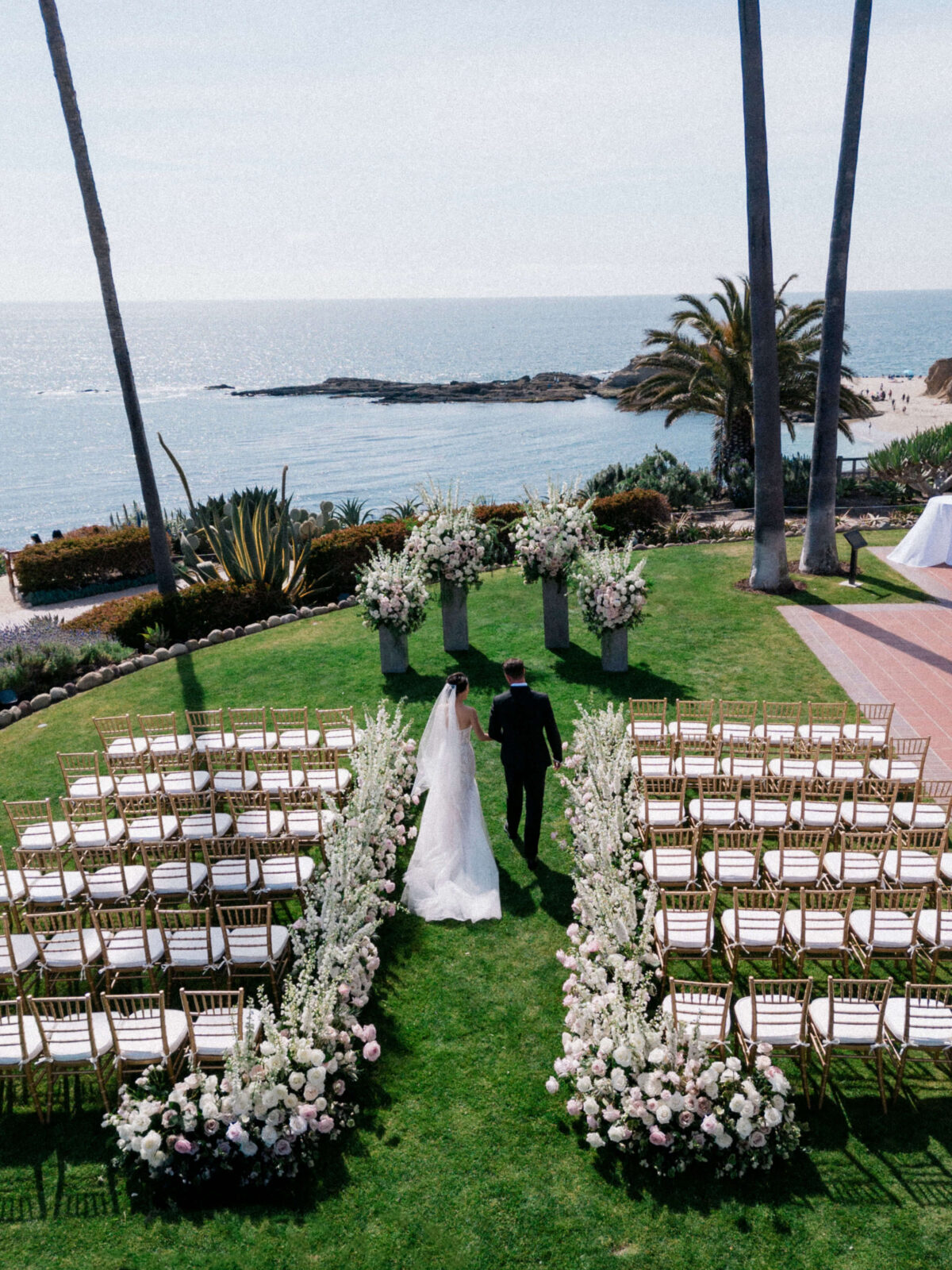 bride and groom walking down the aisle