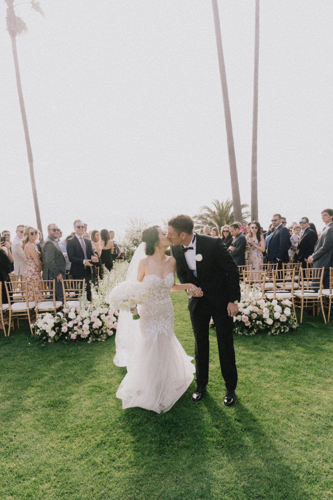 bride and groom kissing 