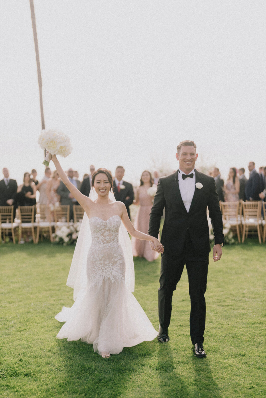 bride and groom walking after exchanged vows