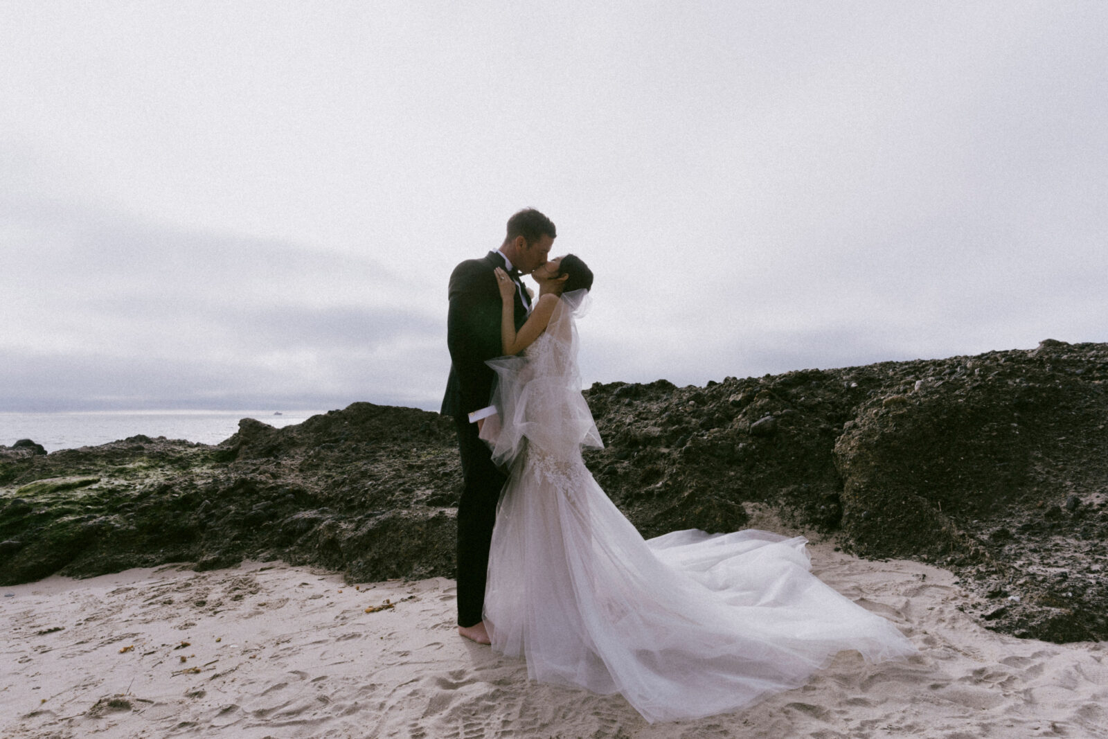 bride and groom kissing