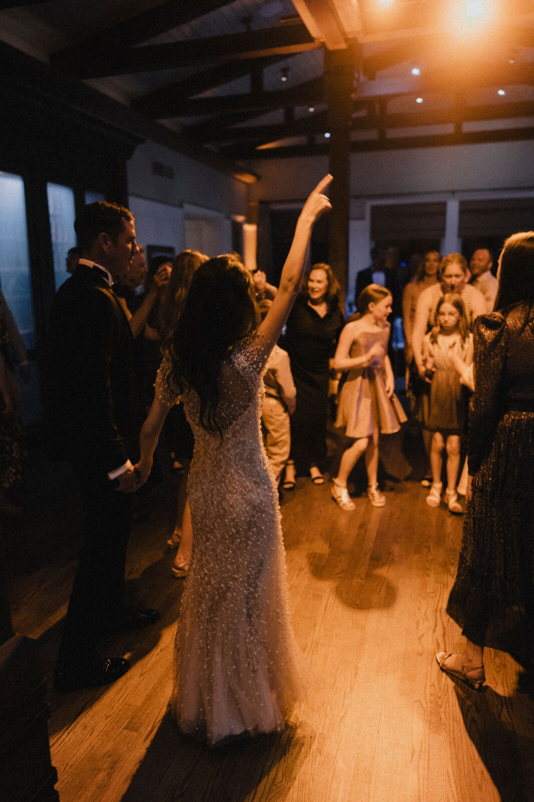 couple happily partying with family