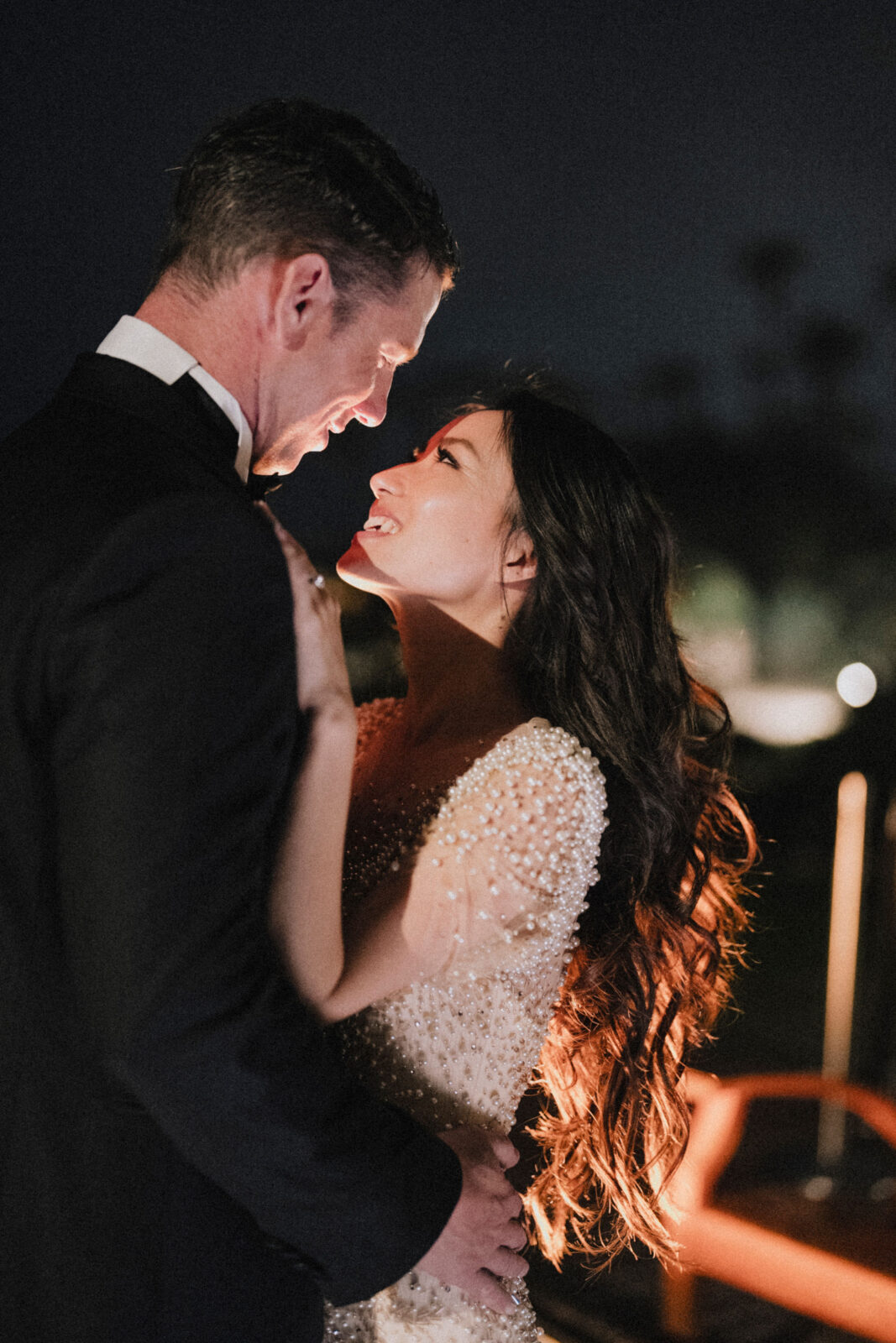 bride and groom staring at each other