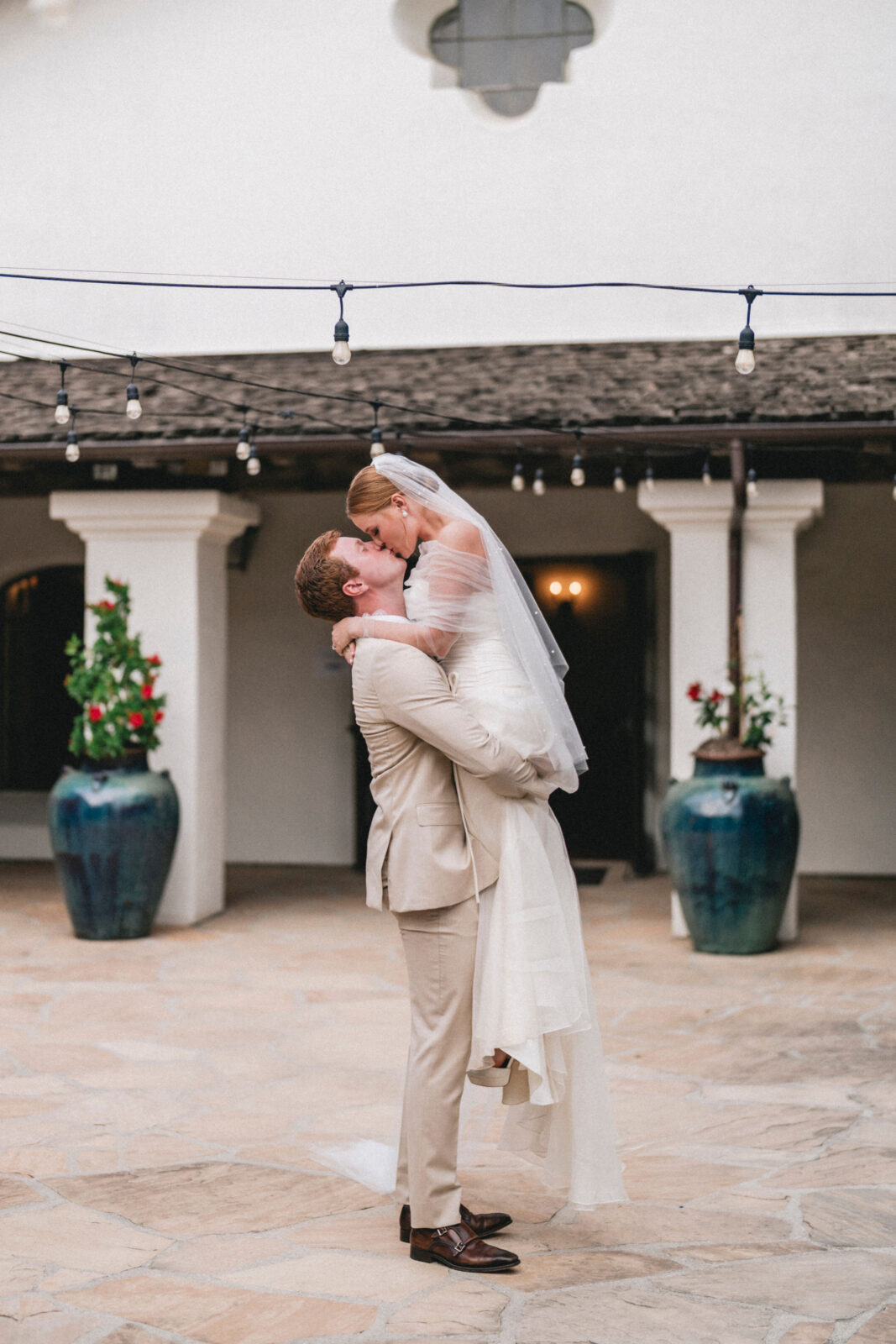 bride and groom kissing