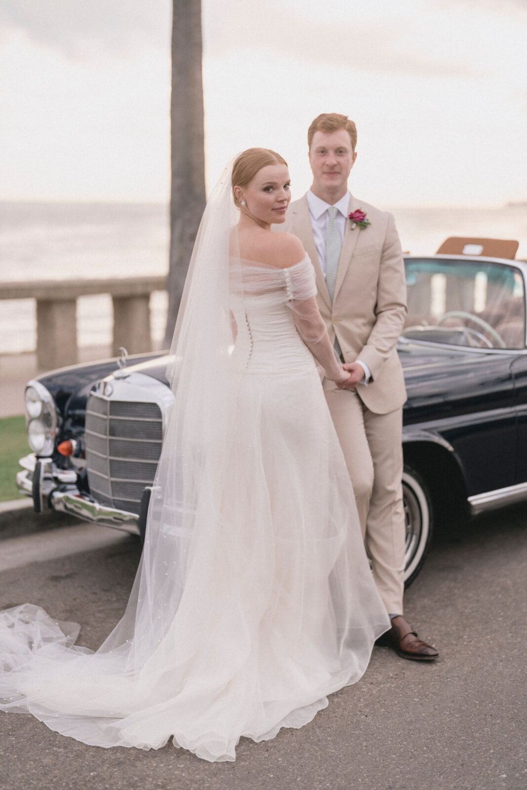 bride and groom flexing