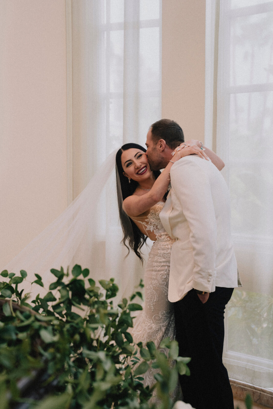 groom kissing bride