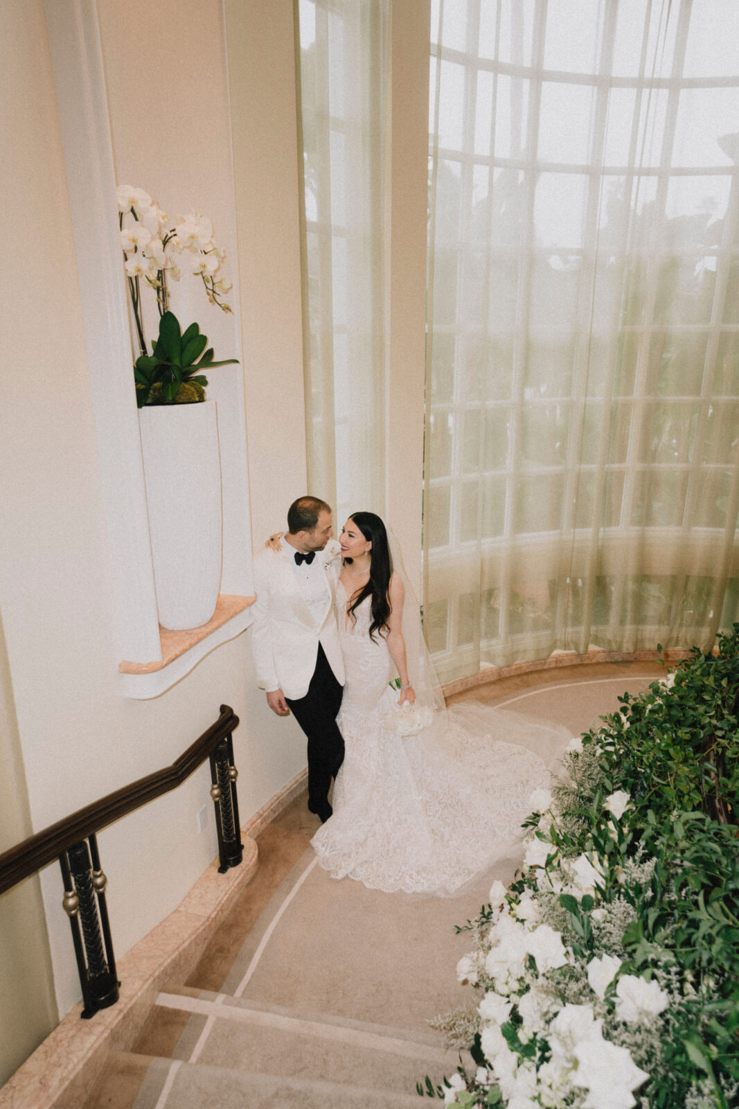 bride and groom staring each other