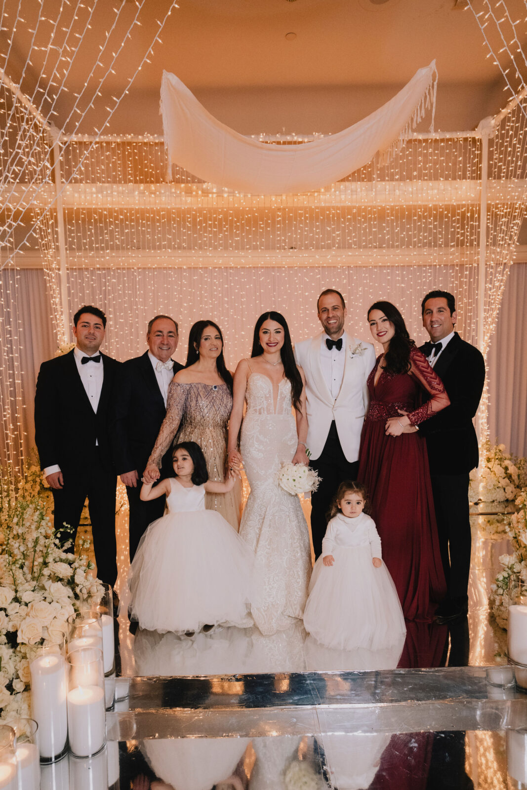 bride and groom with their family