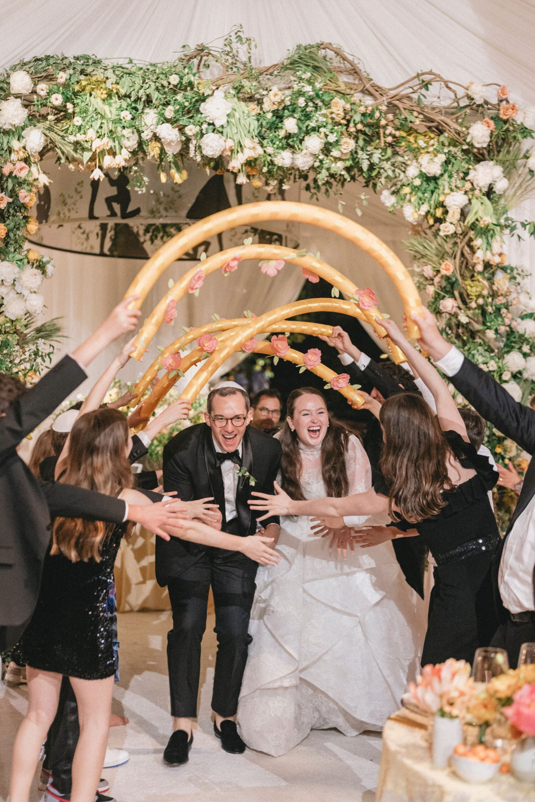 Bride and groom greeted by their family