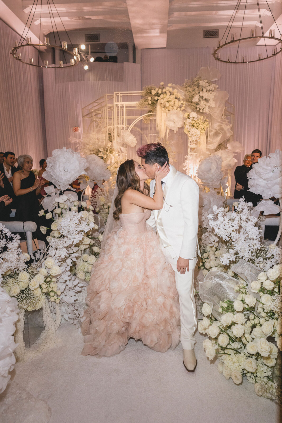 husband and wife kissing