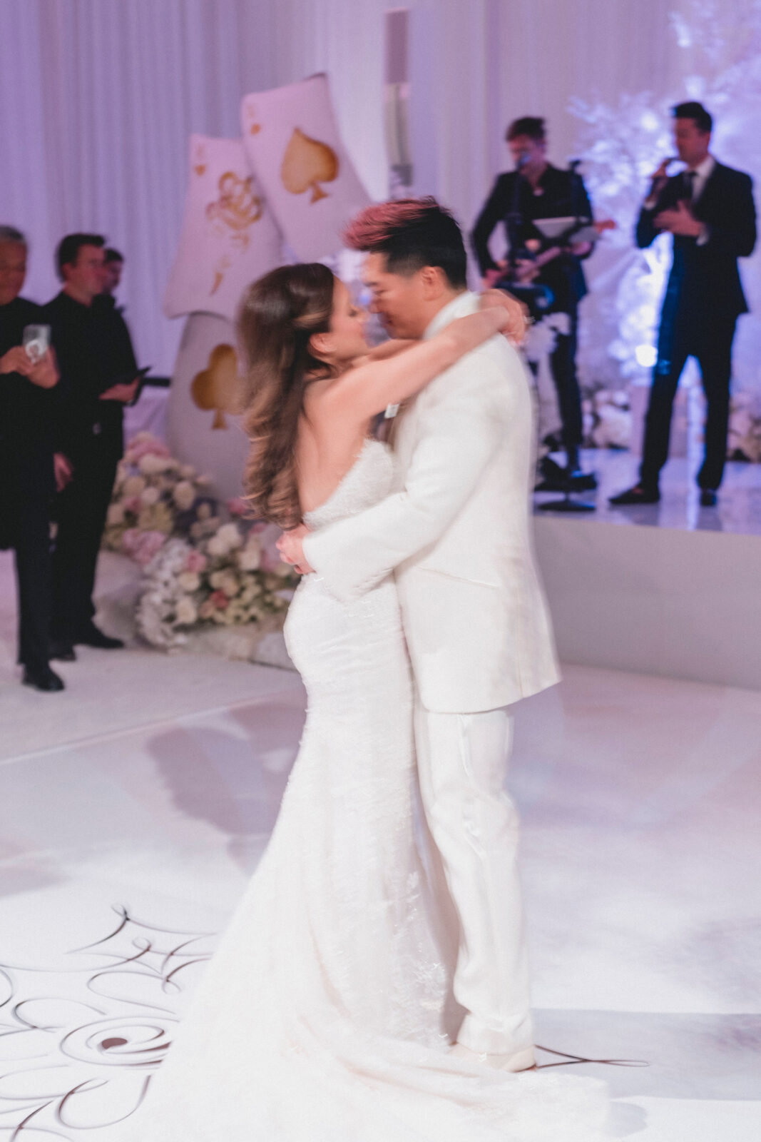 bride and groom dancing