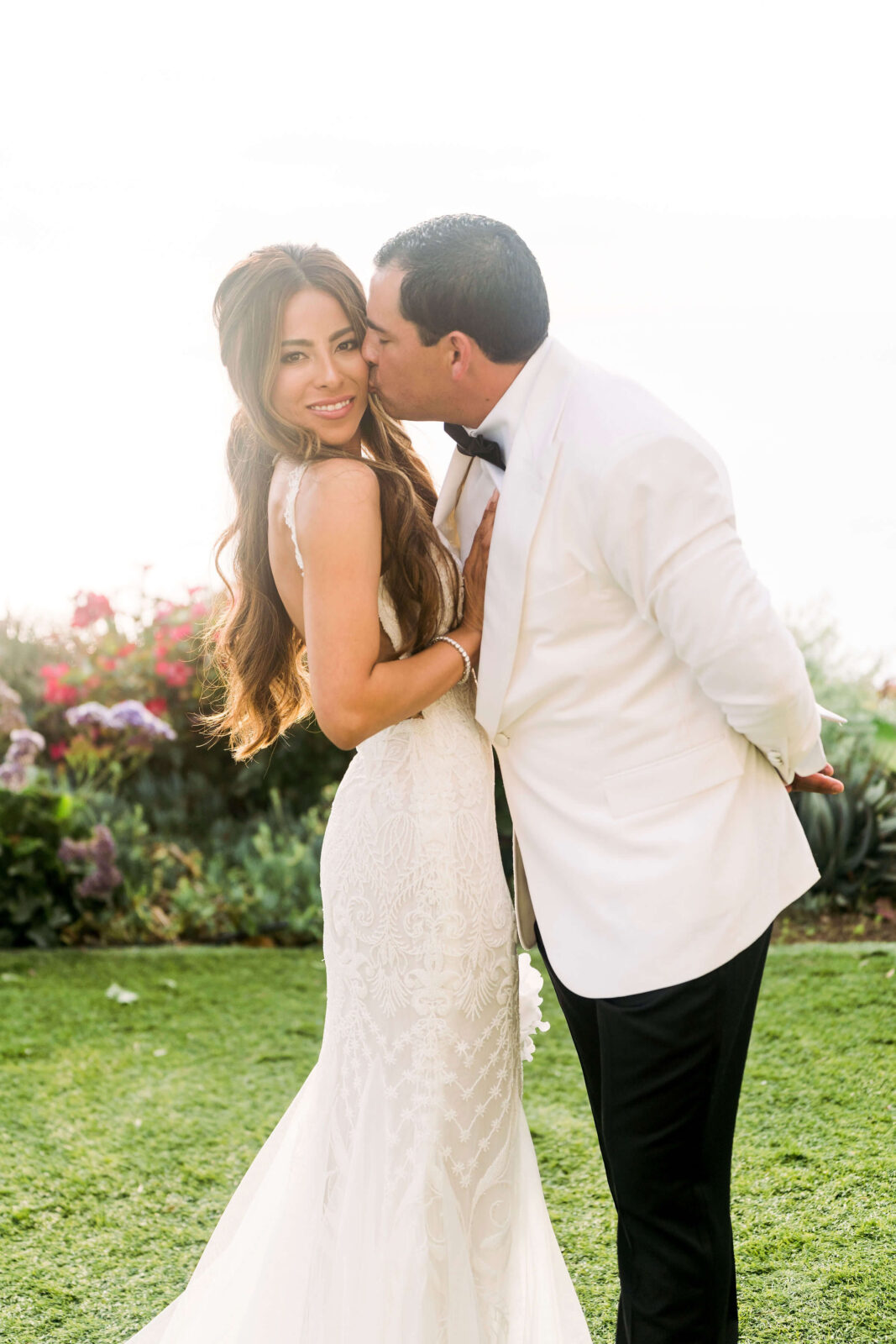 groom kissing the bride