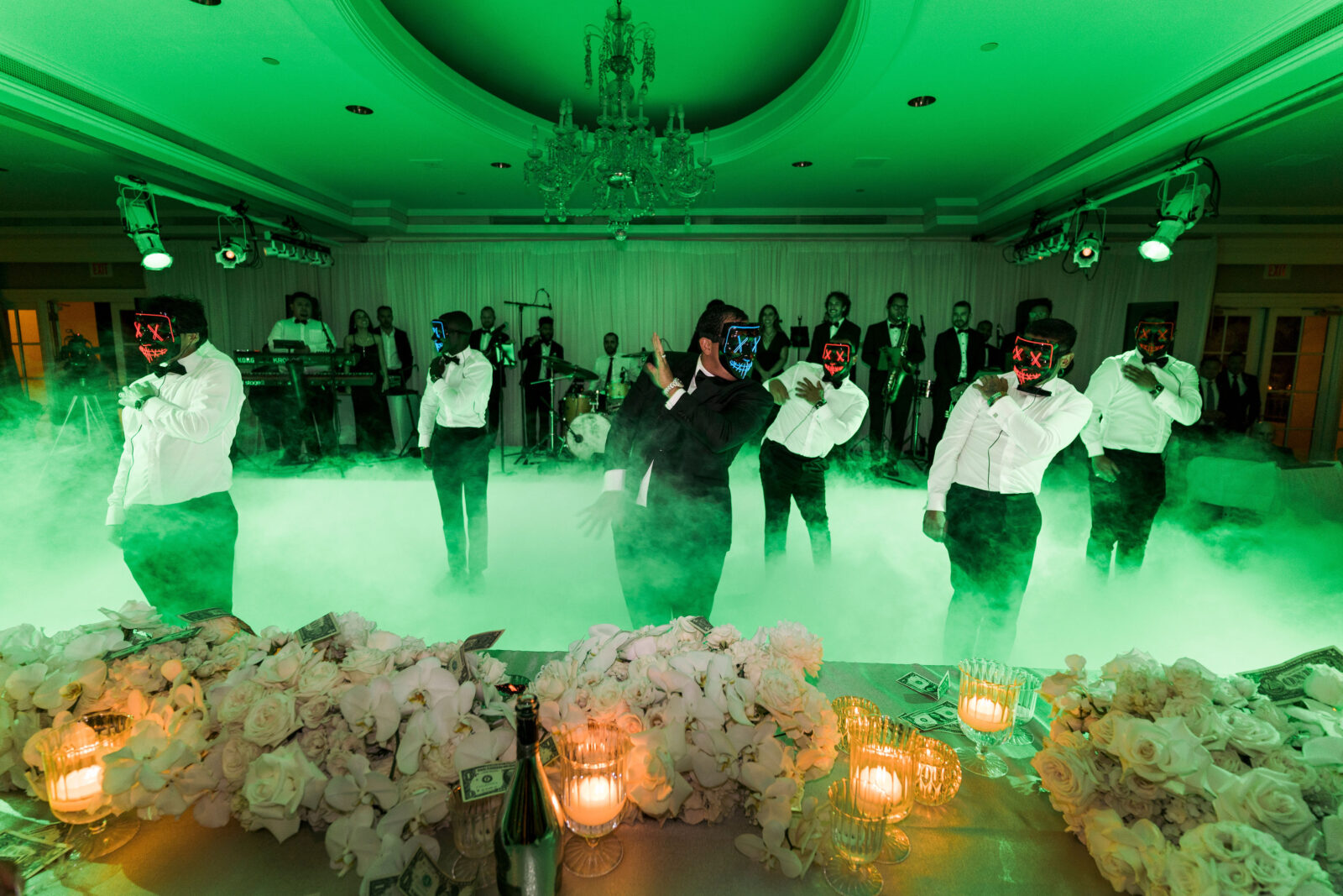 groom and groomsmen dancing