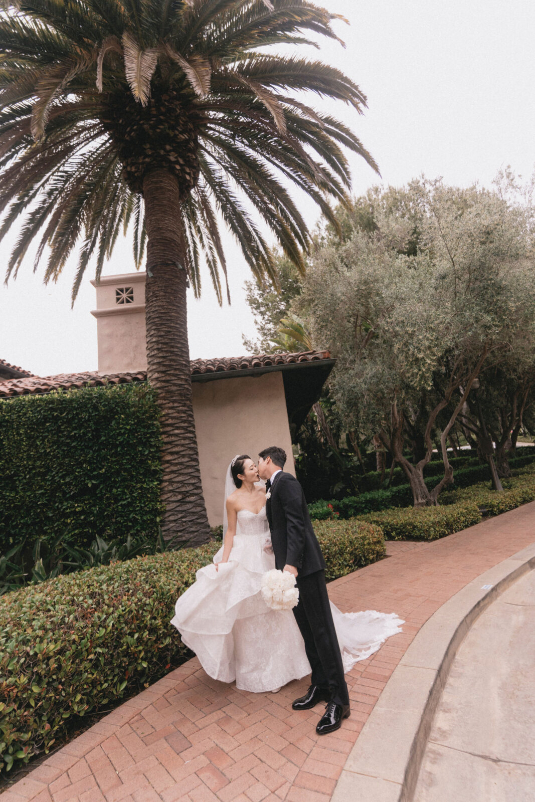 bride and groom kissing