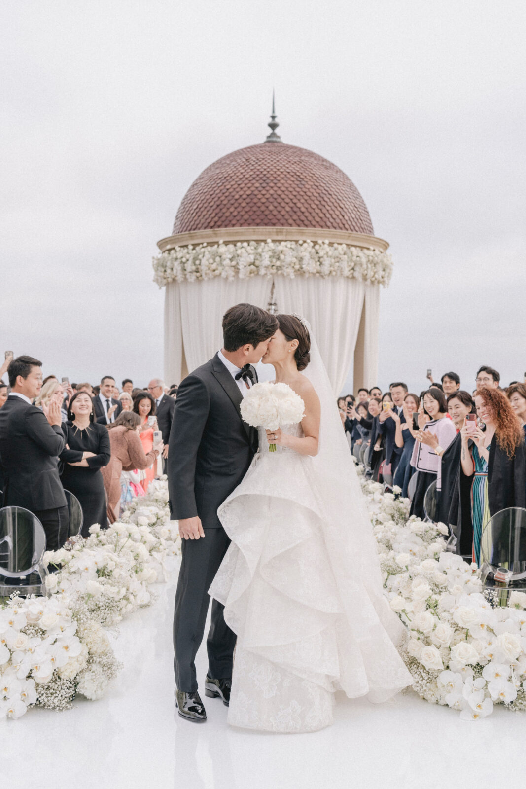 bride and groom kissing