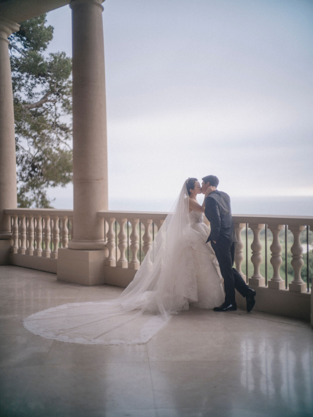 bride and groom kissing