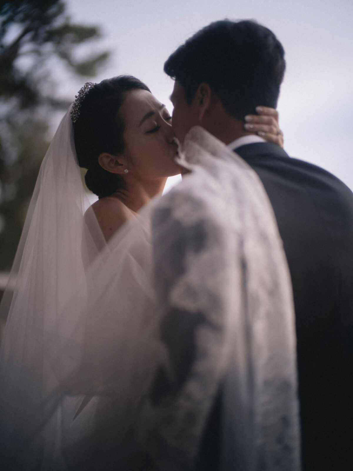 bride and groom kissing